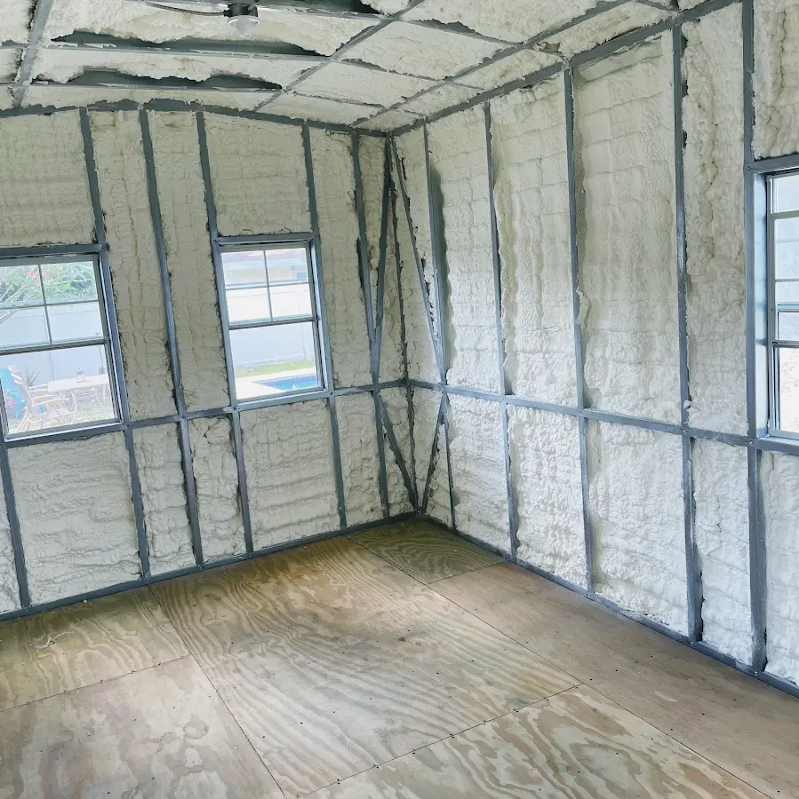 Closed-cell spray foam insulation applied to wall cavities in a residential project in Atascocita
